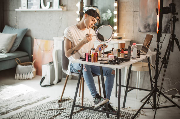 istock Young male makeup artist 957900074