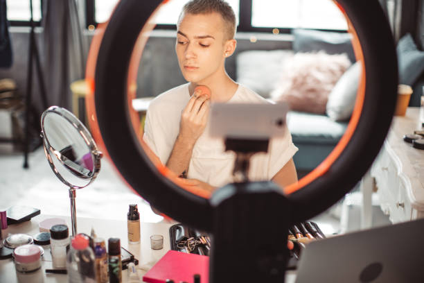 istock Young male makeup artist 957900188