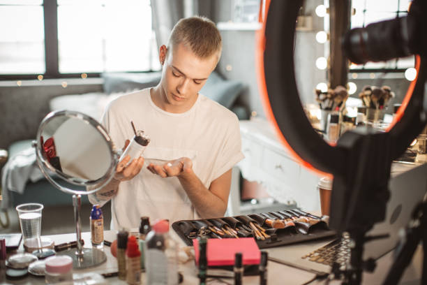 istock Young male makeup artist 957900294