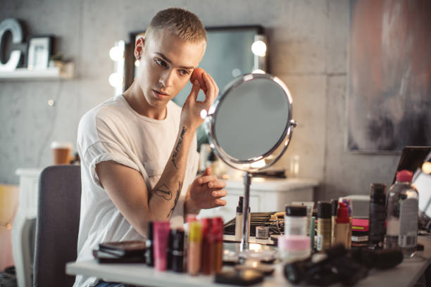istock Young male makeup artist 957900304