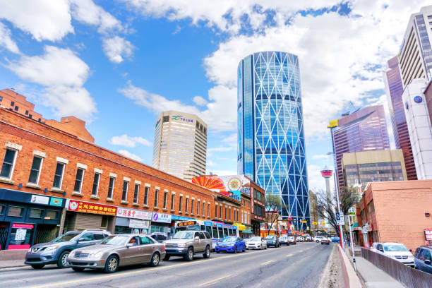 Calgary Chinatown in downtown financial district with The Bow and its iconic Calgary Tower in the background. At 774 feet, The Bow is the second tallest office building in Canada outside of Toronto.