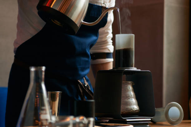 istock Barista making coffee, close-up 957904466