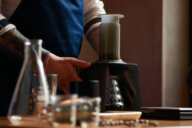 istock Barista making coffee, close-up 957904920