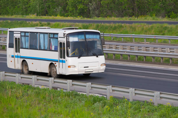 istock bus goes on the highway 957909250