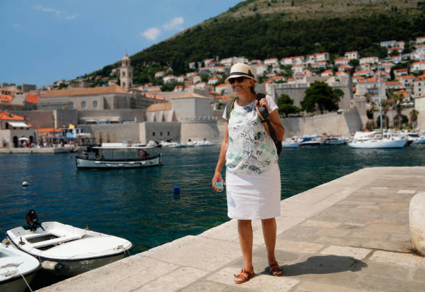 Tourist visiting the beautiful mediterranean town.