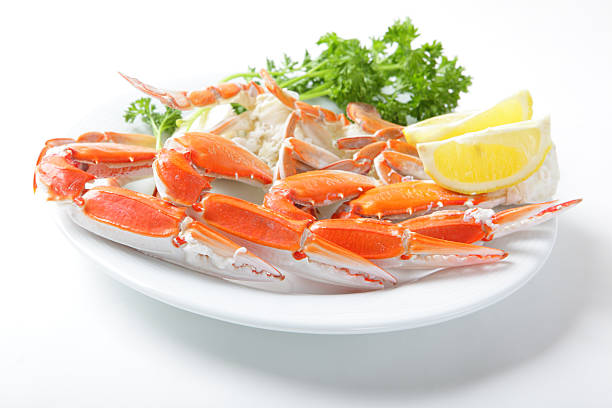 istock Crab legs with lemon and parsley 95791590