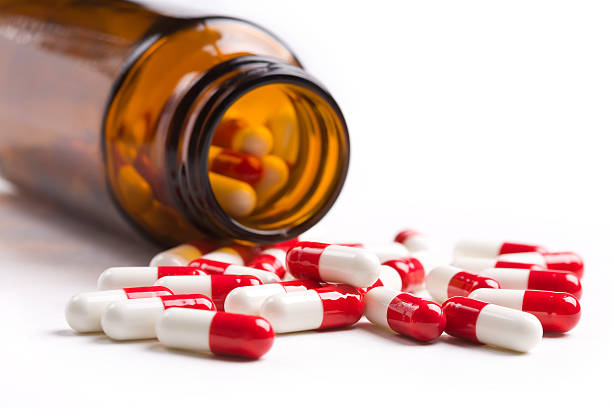 le pillole - antibiotic pain cut out bottle foto e immagini stock