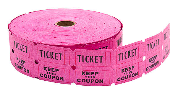 Roll of generic pink raffle tickets on white stock photo
