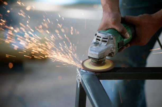 istock The worker is welding metal part of table steel. 957926708