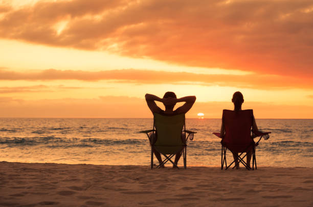 istock Happy couple on the beach 957926798