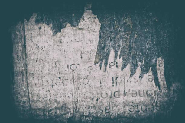 Torn poster after vote on tin textured wall Ripped newspaper.