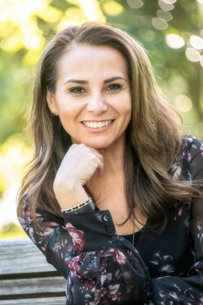 istock Smiling mature woman looking at the camera 957942590