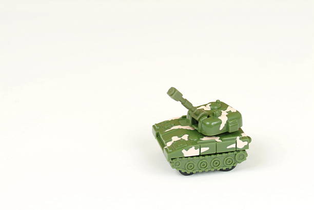 istock Miniature toy tank isolated on white 95795336