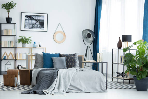 istock Plant in grey bedroom interior 957956528