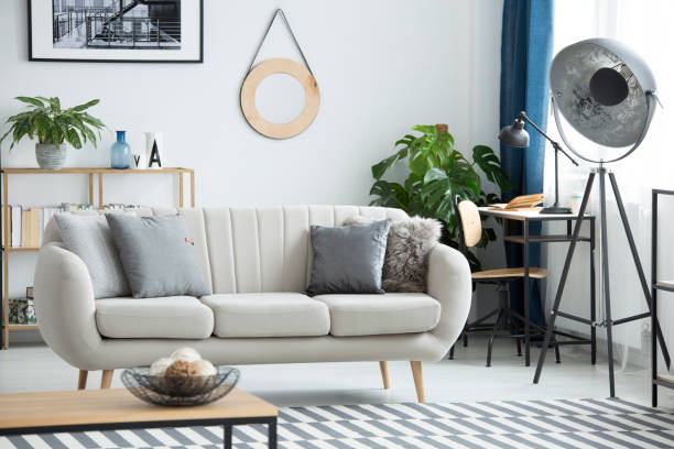 istock Industrial lamp in living room 957956530