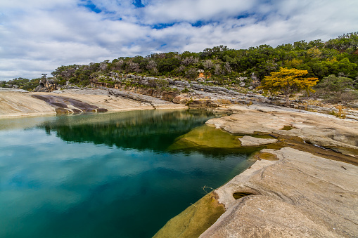 Pedernales Falls State Park in Texas.  Beautiful Rock Formations Carved Smooth by the Crystal Clear Blue-Green Waters of the Pedernales River.