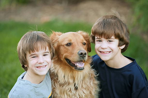 istock Boys Smiling with the Dog 95797642