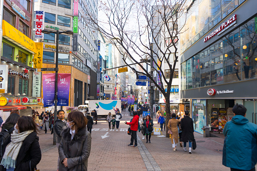 Seoul, South Korea - December 31, 2017 : People shopping and walking in Myeongdong street market in Seoul, South Korea on December 31,2017.
