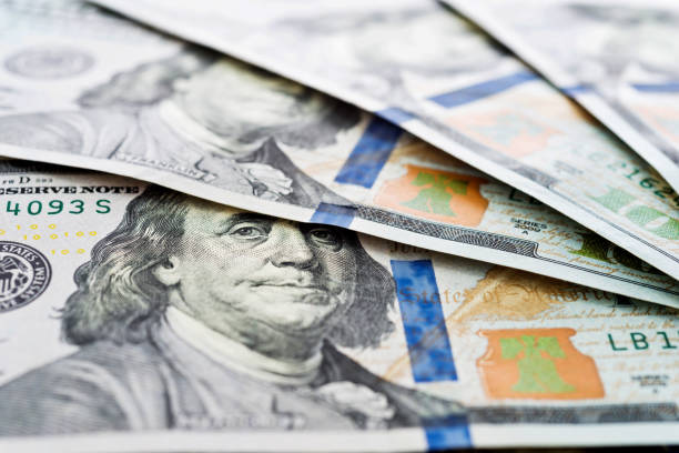 istock Group of one hundred dollar bills 957984106