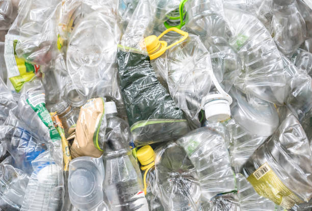 istock Close-up on plastic bottles at a recycling factory 957987704
