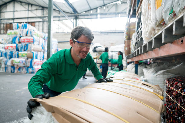 istock Man working in a recycling factory 957987752