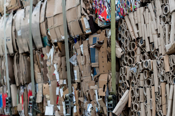 istock Close-up on cardboard boxes at a recycling center 957987778