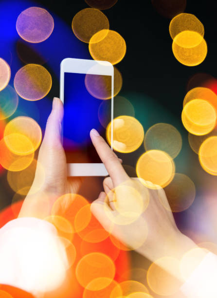 istock Multiple exposure of businesswoman hands using mobile phone 957987816