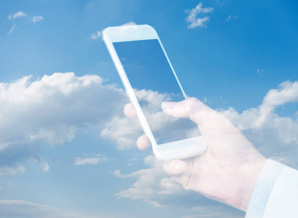 istock Multiple exposure of businesswoman hand using smart phone 957987836
