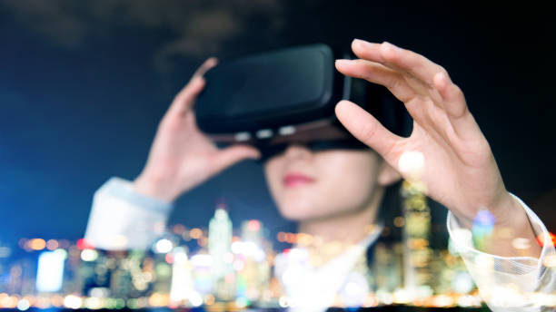 istock Multiple exposure of businesswoman using the virtual reality simulator 957990224