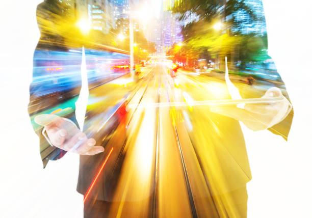 Multiple exposure of businesswoman using digital tablet.