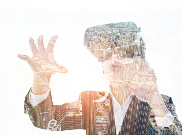 istock Multiple exposure of businesswoman using the virtual reality simulator 957990752