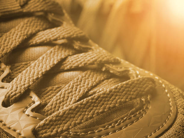 sneakers laces closeup, toned in retro colors