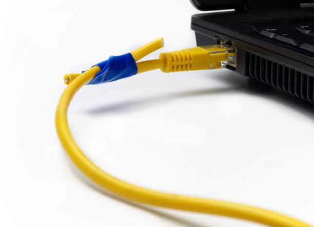 istock broken network cable from laptop connected anyhow with insulating tape on white background, 957991884