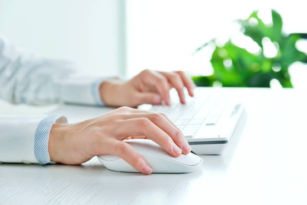 istock Businesswoman hand on computer keyboard 957994358