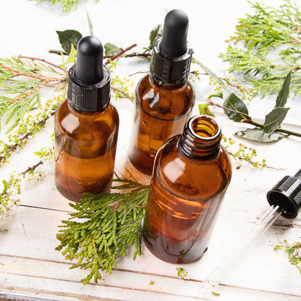 istock Bottles with organic essential aroma oil 957995562