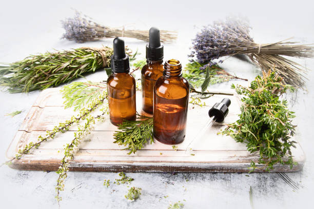 istock Bottles with organic essential aroma oil 957995564