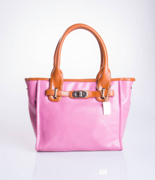 istock women bag on a background 957999166