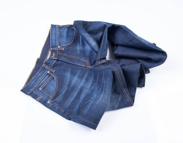 istock jeans or blue jeans on a background 957999574