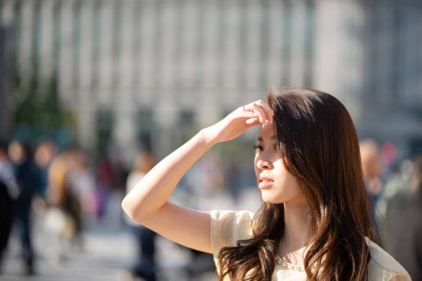 young woman walking in Tokyo, Marunouchi