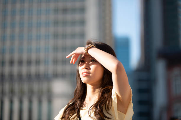 young woman walking in Tokyo, Marunouchi