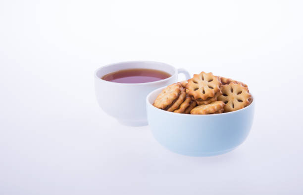 istock cookies or Tea and cookies on background 958003936
