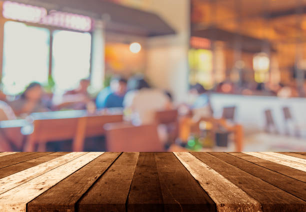 istock wood table and Coffee shop blur background. 958004298