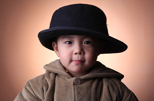istock The little boy wearing a hat 95800489