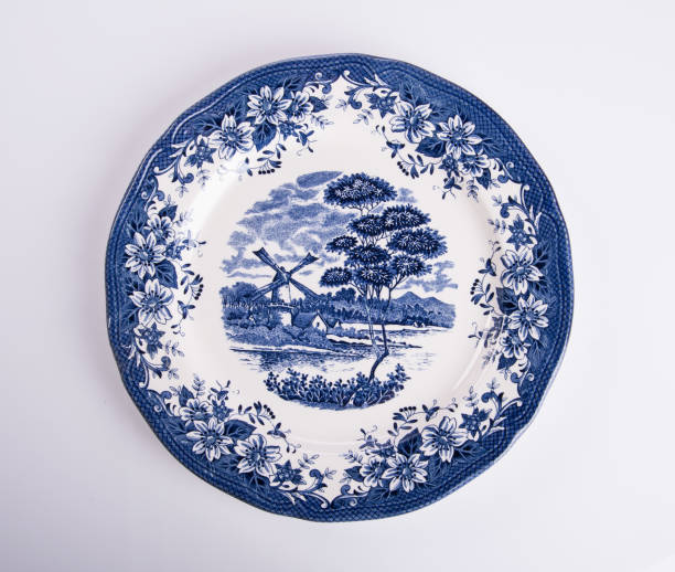 istock plate or flowers on plate painted by hand on background 958005196