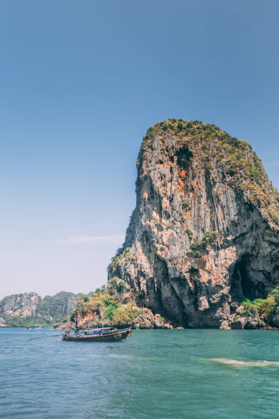 istock Mountain and long tail boat at Thai sea 958009490