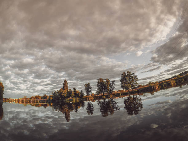 istock Landscape lake mooring reflecting mirror sky 958016024