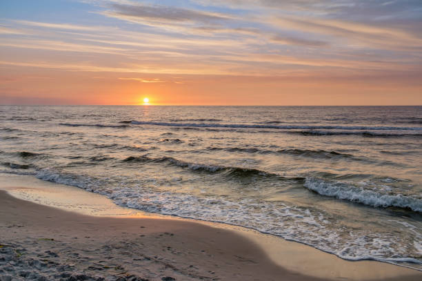 istock Beautiful summer sunset over Baltic sea. 958016230