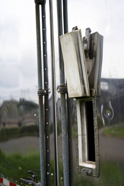 istock Open small window on the old semi trailer with stainless steel walls 958016734