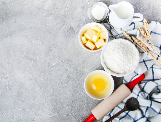 istock Top view of  kitchen table with baking ingredients 958017262
