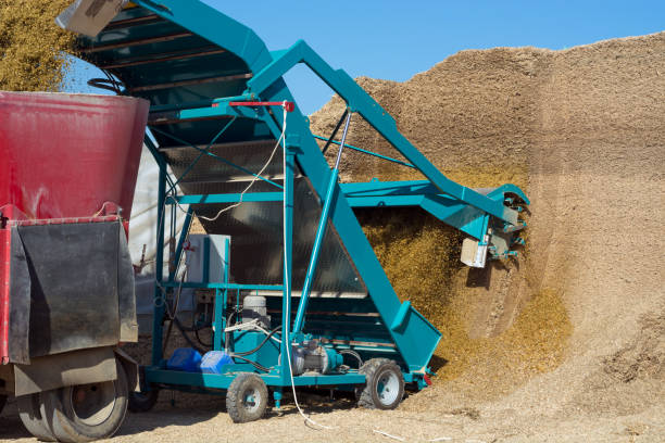 istock the knife assembly extracts the silage from the rammed pit and transports it 958018460
